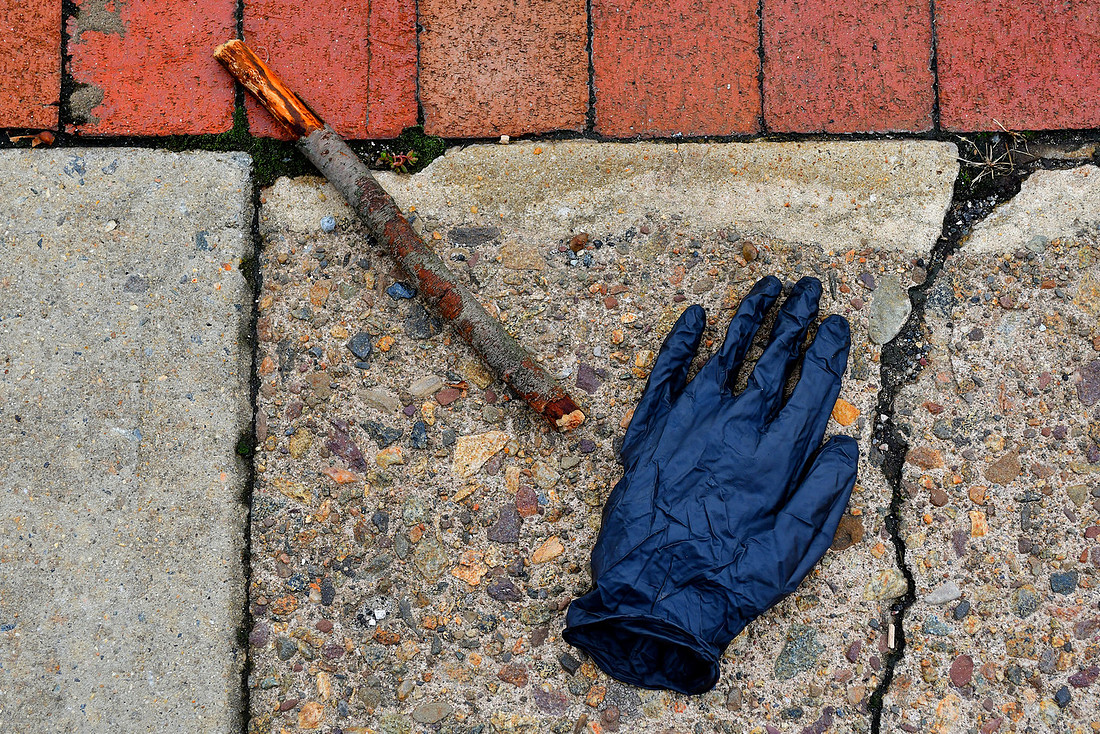 Stick and Blue Glove