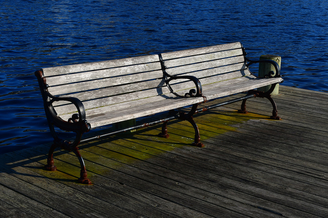 Bench and Blue Water