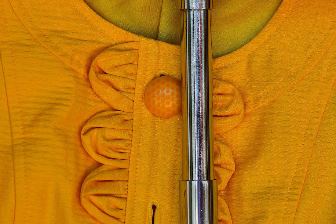 Button and Pole